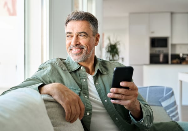 Man on phone financial planning 